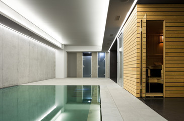 Fototapeta na wymiar Nowoczesny beton dom, kryty basen z sauną