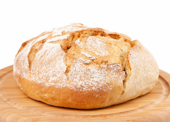 Traditional round bread isolated on a white background