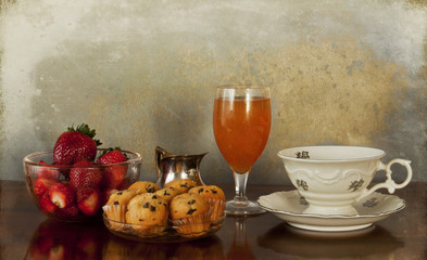 continental breakfast, coffee, juice, muffins and strawberries