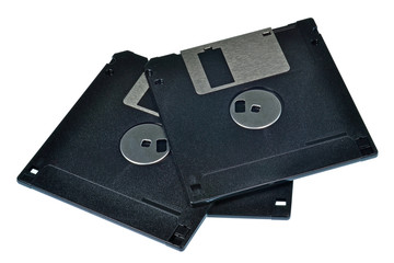 A pile of 3.5 floppy discs isolated on a white background