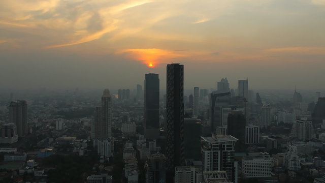 Time Lapse Bangkok at Sunset. Pan movement.