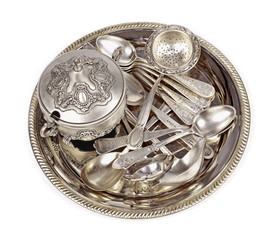 Old antique silverware, isolated white background