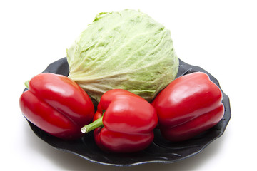 Paprika auf Holzteller