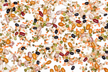 Legumes and cereales close up in white background