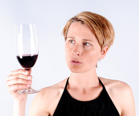 woman with a glass of red wine