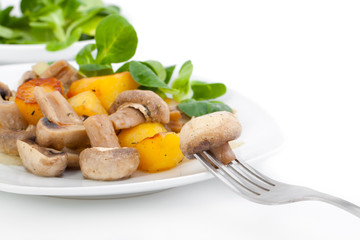 Champignon mushrooms served with baked potato and salad