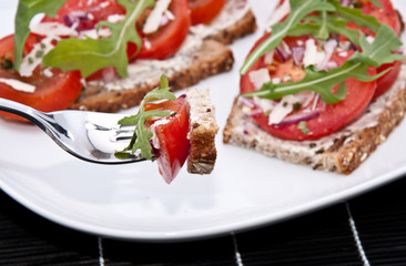 Tomato bread with piece on a fork