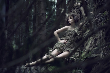 Eco lady lying on the trunk