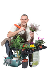 Smiling gardener on white background