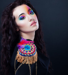 Woman in carnival uniform retro costume. Bright colorful makeup