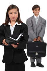 Kids dressed as businesspeople