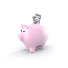 Pink Piggy Bank with British bank notes