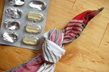 Tabletten - Knoten im Taschentuch