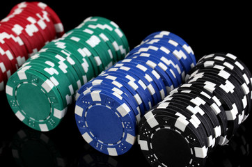 Casino chips isolated on black