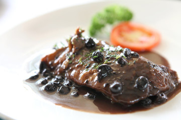 Duck confit , Roasted duck with blueberry sauce