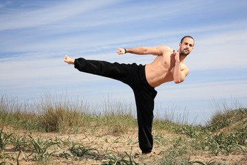 young male fighter exercise outdoor