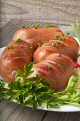 sausages on the grill