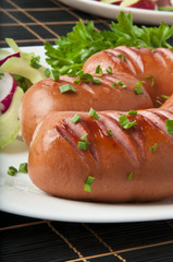 sausages on the grill