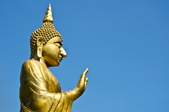 big gold image of buddha