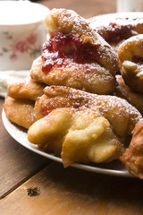 Sweet doughnuts with rose marmelade