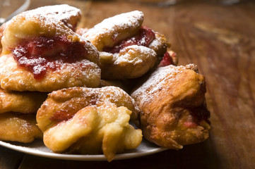 Sweet doughnuts with rose marmelade