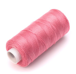 Pink spool of thread