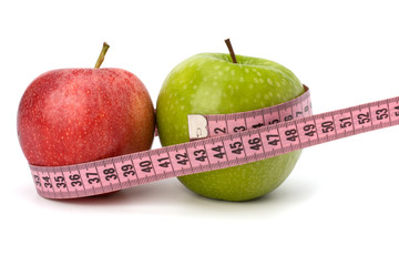 Apple with tape measure. Healthy lifestyle concept.