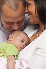 Mixed Race Young Family with Newborn Baby