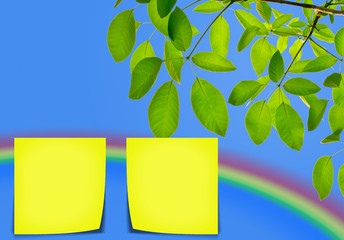 Yellow memo stick on sky and rainbow background
