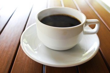 Black Coffee white cup on the table.