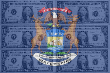 US state of michigan flag with transparent dollar banknotes in b