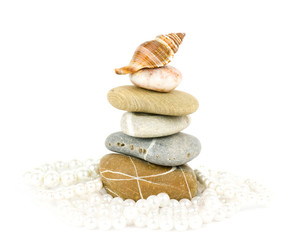 Naklejka na ściany i meble Beautiful exotic shell and stones, pearls on white background.