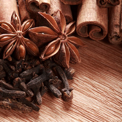 Herbs and Spices over wooden background