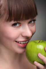 Beauty girl with green apple