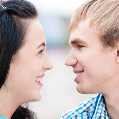 Portrait of a beautiful young happy smiling couple