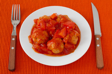 turkey meatballs with tomato paste on the plate
