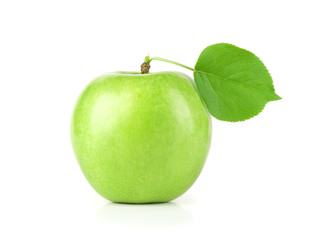 Ripe green apple with a leaf