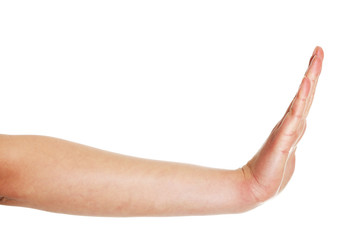 Womans hand showing stop gesture