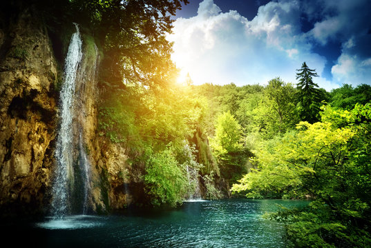 waterfall in deep forest © Iakov Kalinin