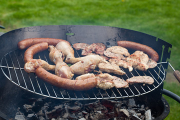 barbecue with delicious grilled meat on grill