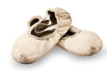 Used and dirty pink ballet slipper, isolated in white background © gio_cala