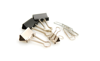 Paperclips and binders isolated on white