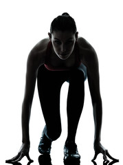 woman sprinter on starting block