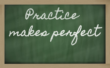 Obraz premium expression - Practice makes perfect - written on a school black