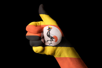 uganda national flag thumb up gesture for excellence and achieve