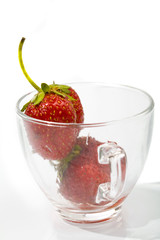 strawberries in glass cup