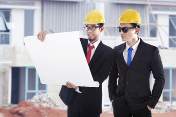 Engineers at construction site