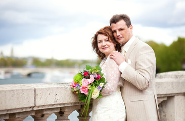 Happy just married couple outdoors