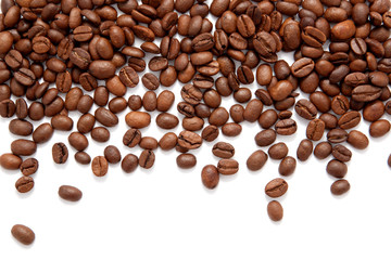 Brown roasted coffee beans isolated on white