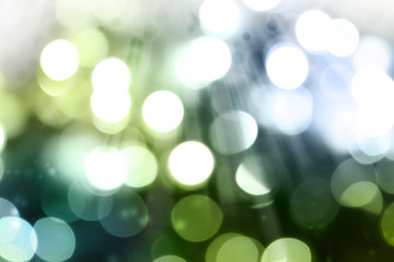 Abstract green spring bokeh light forest background